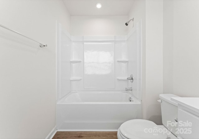 110 Browband St, Troutman, NC 28166 - bathroom featuring toilet, shower / washtub combination, vanity, wood finished floors, and recessed lighting