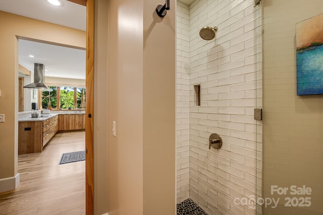 7 Bee Balm Way, Asheville, NC 28804 - full bathroom with tiled shower, wood finished floors, vanity, and recessed lighting