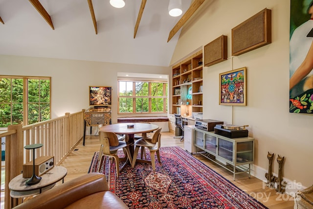 7 Bee Balm Way, Asheville, NC 28804 - dining area with beamed ceiling, light wood-style flooring, plenty of natural light, and high vaulted ceiling