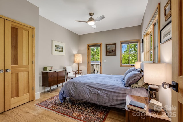 7 Bee Balm Way, Asheville, NC 28804 - bedroom featuring light wood-type flooring, access to outside, and a ceiling fan