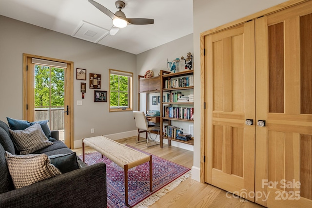 7 Bee Balm Way, Asheville, NC 28804 - living room with light wood-style floors, ceiling fan, and baseboards