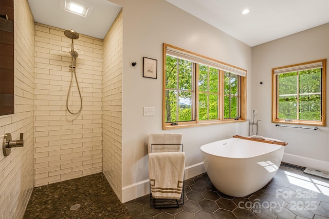 7 Bee Balm Way, Asheville, NC 28804 - bathroom with a tile shower, healthy amount of natural light, a freestanding bath, baseboards, and recessed lighting
