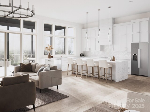 51 Bridgeway Dr Unit 12, Candler, NC 28715 - living room featuring light wood-style flooring