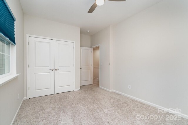 829 River Park Rd, Belmont, NC 28012 - unfurnished bedroom with carpet floors, a closet, baseboards, and a ceiling fan
