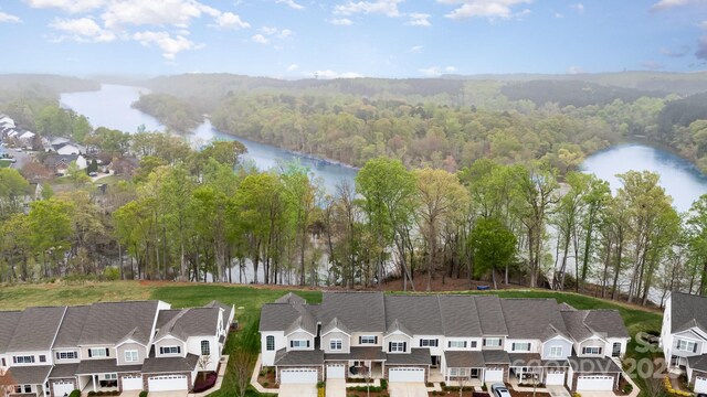 829 River Park Rd, Belmont, NC 28012 - aerial view of residential area featuring a nearby body of water and a heavily wooded area