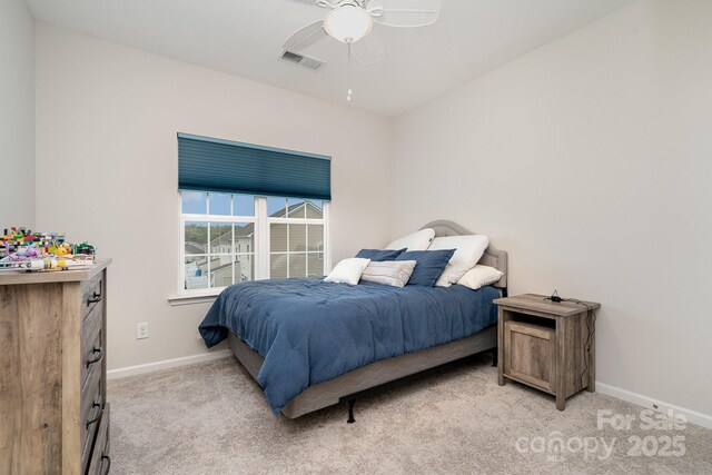 829 River Park Rd, Belmont, NC 28012 - bedroom with light colored carpet, baseboards, and a ceiling fan