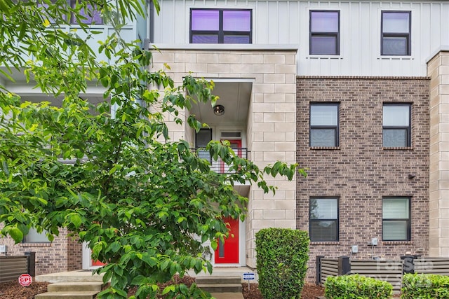 1162 E 36th St, Charlotte, NC 28205 - view of front facade with brick siding and board and batten siding