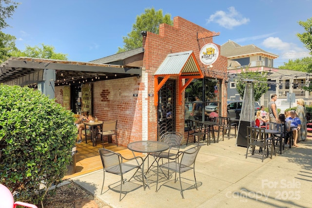 1162 E 36th St, Charlotte, NC 28205 - view of patio with outdoor dining area