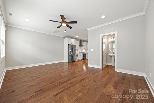 1162 E 36th St, Charlotte, NC 28205 - unfurnished living room featuring crown molding, ceiling fan, dark wood-style floors, baseboards, and healthy amount of natural light