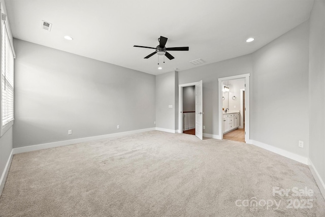 1162 E 36th St, Charlotte, NC 28205 - unfurnished bedroom with light colored carpet, baseboards, ensuite bathroom, recessed lighting, and ceiling fan