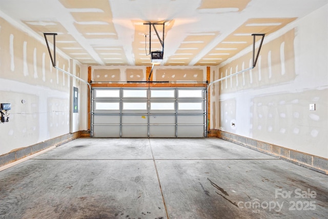 1162 E 36th St, Charlotte, NC 28205 - garage with a garage door opener and electric panel