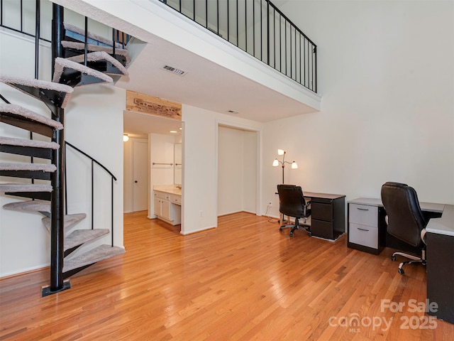 4025 Woodfox Dr, Charlotte, NC 28277 - office featuring light wood finished floors and a towering ceiling