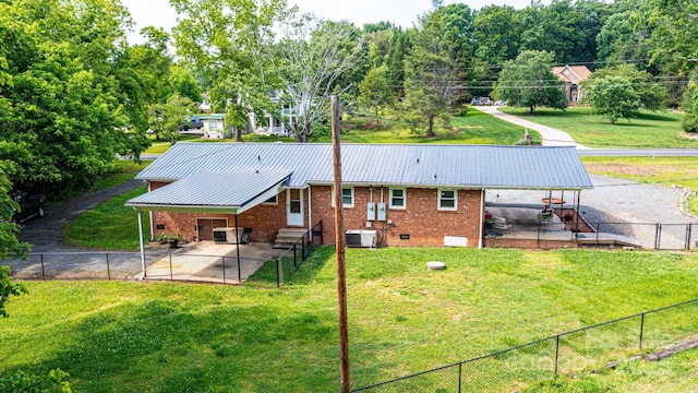 1094/1092 Curve View Rd, Lincolnton, NC 28092 - back of property featuring metal roof, brick siding, and central AC unit
