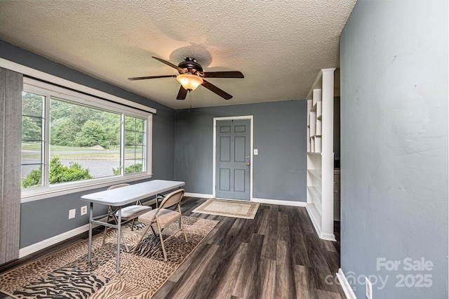 1094/1092 Curve View Rd, Lincolnton, NC 28092 - office featuring dark wood-style flooring, baseboards, a ceiling fan, and a textured ceiling