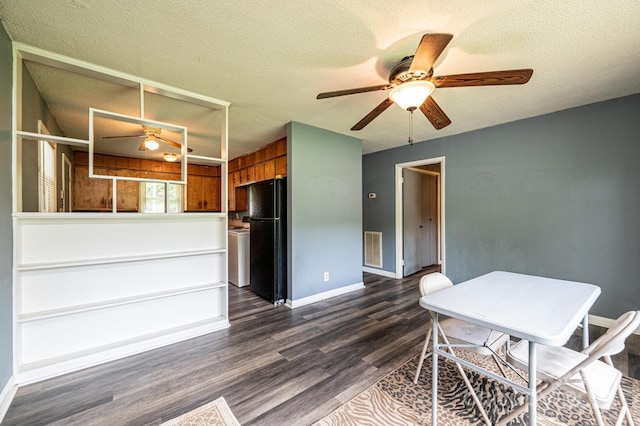 1094/1092 Curve View Rd, Lincolnton, NC 28092 - kitchen with freestanding refrigerator, ceiling fan, dark wood-style floors, brown cabinetry, and a textured ceiling