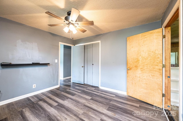 1094/1092 Curve View Rd, Lincolnton, NC 28092 - unfurnished bedroom with wood finished floors, baseboards, a closet, a textured ceiling, and a ceiling fan