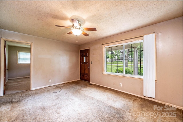 1094/1092 Curve View Rd, Lincolnton, NC 28092 - unfurnished room featuring carpet flooring, a ceiling fan, a textured ceiling, and baseboards