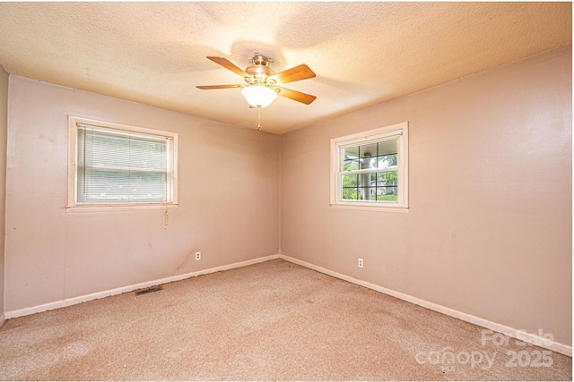 1094/1092 Curve View Rd, Lincolnton, NC 28092 - carpeted empty room featuring ceiling fan, baseboards, and a textured ceiling
