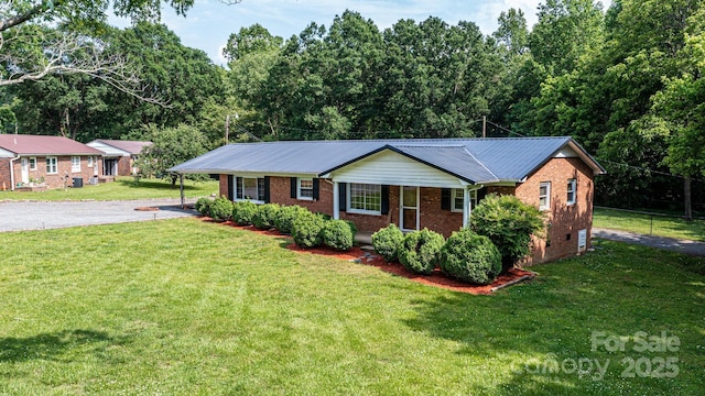 1094/1092 Curve View Rd, Lincolnton, NC 28092 - ranch-style house with asphalt driveway, brick siding, a front yard, and metal roof