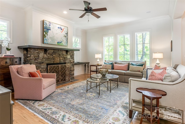 20 E Owl Creek Ln, Fairview, NC 28730 - living area with plenty of natural light, ceiling fan, ornamental molding, light wood-style floors, and a fireplace
