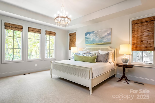 20 E Owl Creek Ln, Fairview, NC 28730 - bedroom with a chandelier, multiple windows, and baseboards