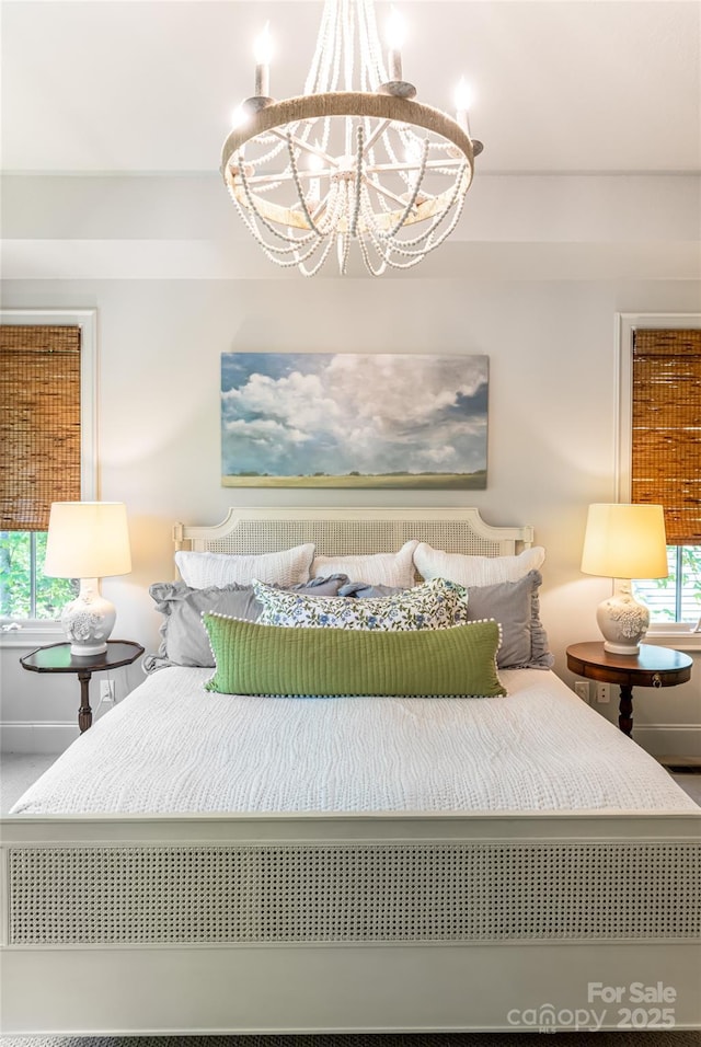 20 E Owl Creek Ln, Fairview, NC 28730 - bedroom with a chandelier
