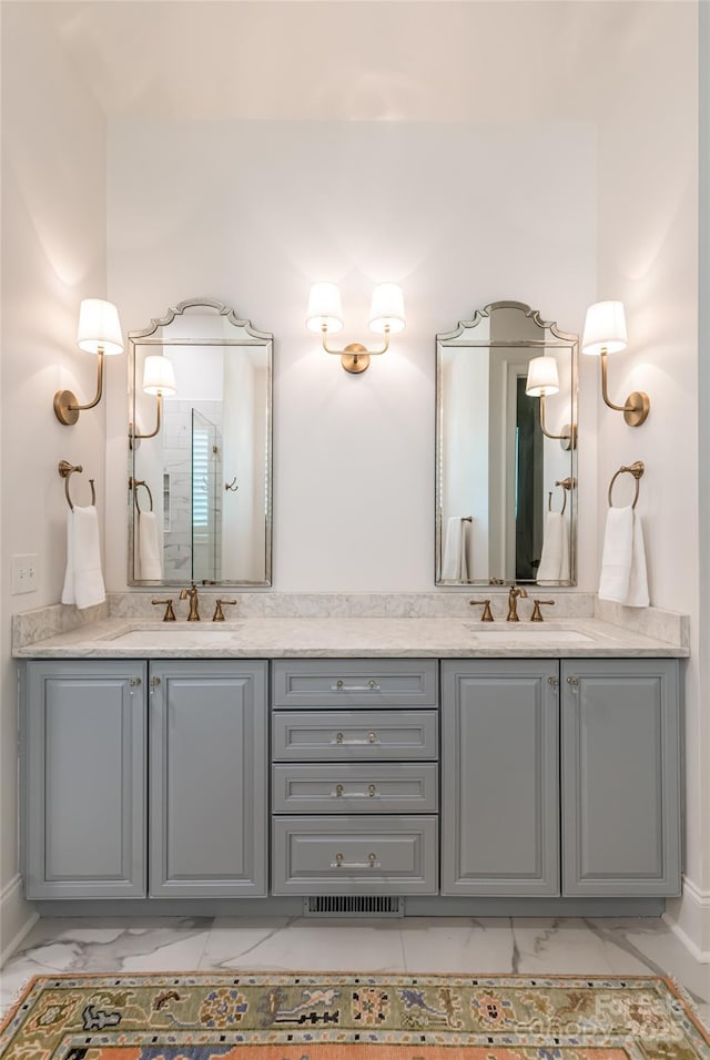 20 E Owl Creek Ln, Fairview, NC 28730 - full bath featuring marble look tile flooring, double vanity, and a shower