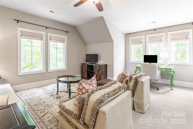 20 E Owl Creek Ln, Fairview, NC 28730 - carpeted living room featuring baseboards, plenty of natural light, ceiling fan, and lofted ceiling
