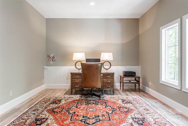 20 E Owl Creek Ln, Fairview, NC 28730 - home office with plenty of natural light, light wood-style flooring, wainscoting, and baseboards