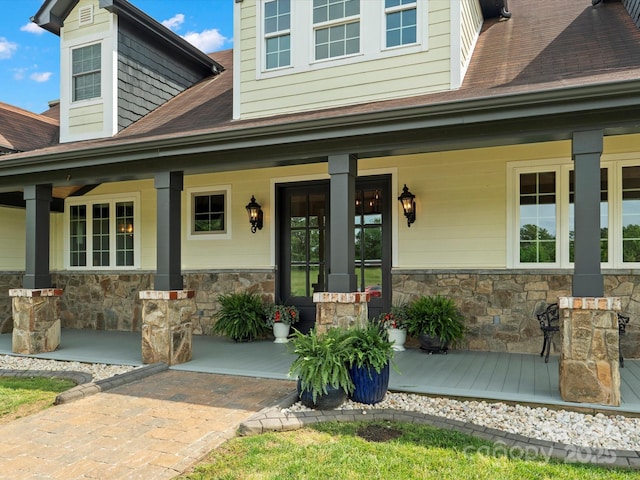 2521 Neely Store Rd, Rock Hill, SC 29730 - view of exterior entry with covered porch, stone siding, and a shingled roof