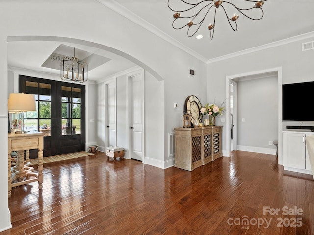 2521 Neely Store Rd, Rock Hill, SC 29730 - foyer with a chandelier, arched walkways, wood-type flooring, crown molding, and french doors