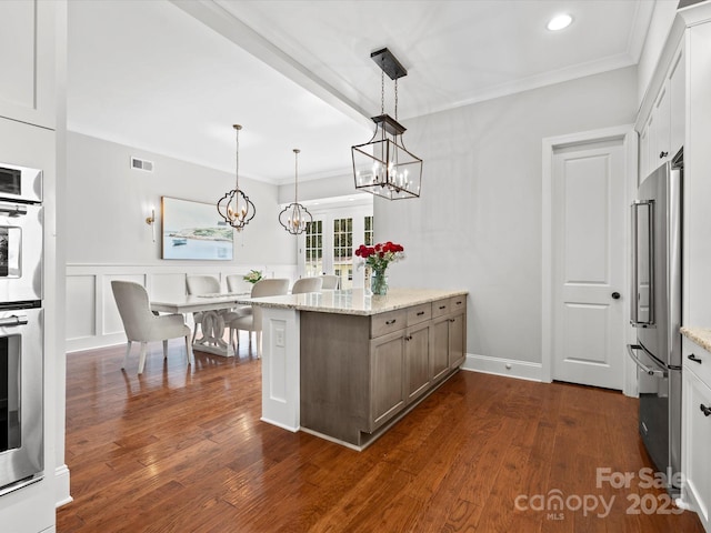 2521 Neely Store Rd, Rock Hill, SC 29730 - kitchen with high end fridge, a chandelier, light stone countertops, a peninsula, and decorative light fixtures