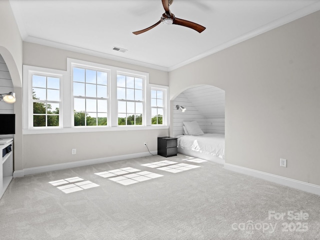 2521 Neely Store Rd, Rock Hill, SC 29730 - unfurnished living room with a ceiling fan, healthy amount of natural light, carpet, arched walkways, and ornamental molding