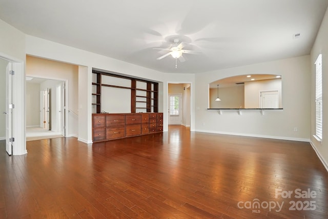 1030 Pinehurst Ln, Fort Mill, SC 29707 - unfurnished living room featuring ceiling fan, wood finished floors, and baseboards