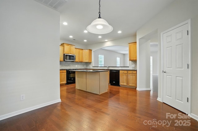 1030 Pinehurst Ln, Fort Mill, SC 29707 - kitchen with black appliances, arched walkways, dark wood-style floors, dark countertops, and backsplash
