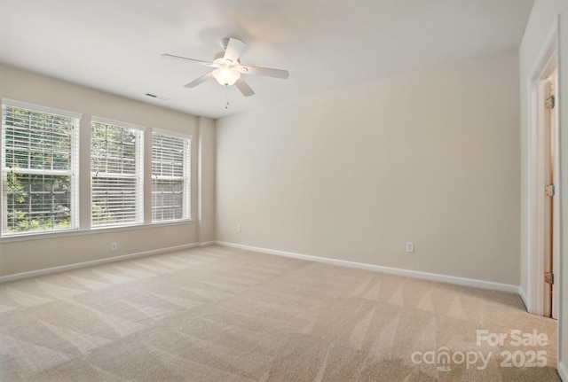 1030 Pinehurst Ln, Fort Mill, SC 29707 - unfurnished room featuring light carpet, a ceiling fan, and baseboards