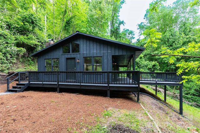 214 Hidden Creek Ln, Burnsville, NC 28714 - view of front of property with a wooden deck and a chimney