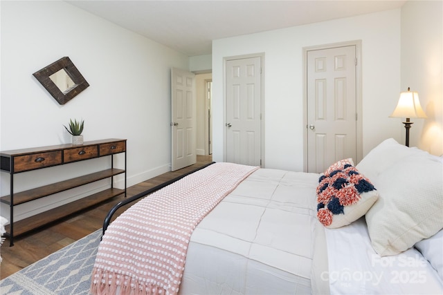 214 Hidden Creek Ln, Burnsville, NC 28714 - bedroom featuring wood finished floors and baseboards