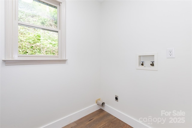 214 Hidden Creek Ln, Burnsville, NC 28714 - laundry area with electric dryer hookup, baseboards, dark wood finished floors, and washer hookup