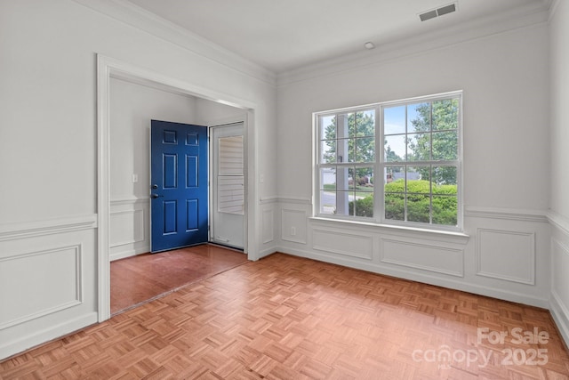 1534 Piney Church Rd, Concord, NC 28025 - foyer featuring wainscoting, a decorative wall, and ornamental molding