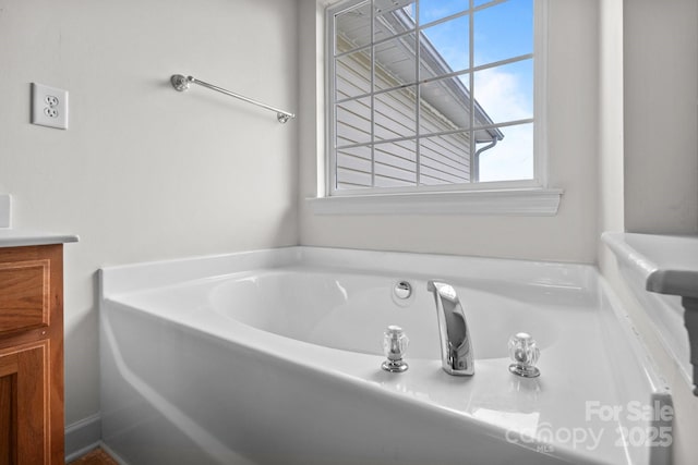 1534 Piney Church Rd, Concord, NC 28025 - full bathroom with healthy amount of natural light, a bath, and vanity