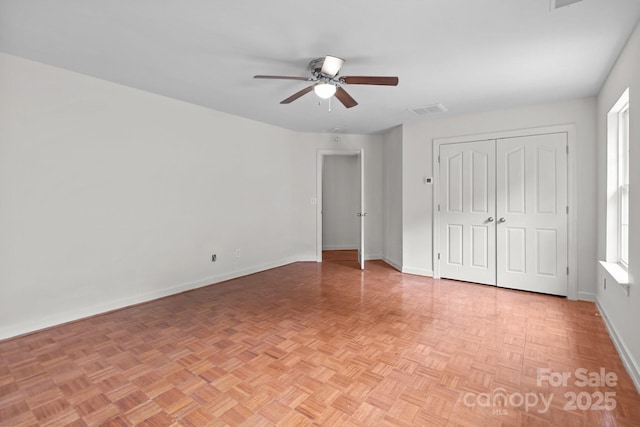 1534 Piney Church Rd, Concord, NC 28025 - unfurnished bedroom featuring baseboards, a ceiling fan, and a closet