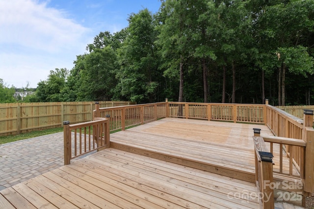 1534 Piney Church Rd, Concord, NC 28025 - deck featuring a fenced backyard, view of scattered trees, and a patio area