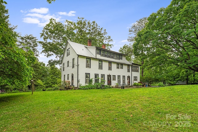 1186 US-70 Hwy, Black Mountain, NC 28711 - colonial home featuring a chimney and a front yard