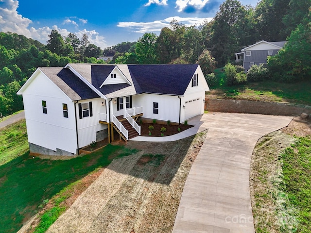 220 Pine Ridge Rd, Mars Hill, NC 28754 - view of front of property featuring concrete driveway, a garage, crawl space, and roof with shingles