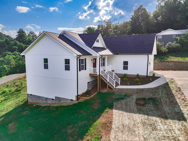 220 Pine Ridge Rd, Mars Hill, NC 28754 - view of front of home with crawl space, a front yard, and a shingled roof