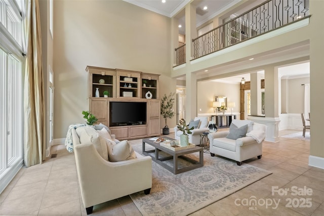 14515 Nolen Ln, Charlotte, NC 28277 - living area featuring ornamental molding, a high ceiling, and tile patterned floors