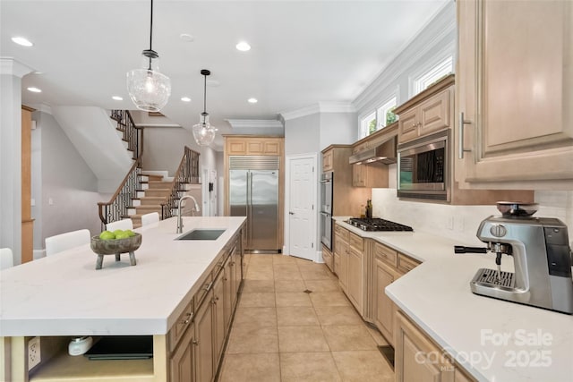 14515 Nolen Ln, Charlotte, NC 28277 - kitchen featuring built in appliances, a sink, a center island with sink, recessed lighting, and crown molding