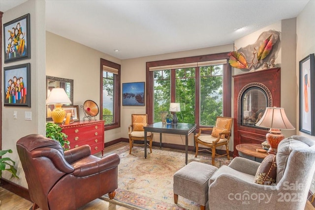 2461 Eagles Nest Rd, Waynesville, NC 28786 - sitting room with baseboards and wood finished floors