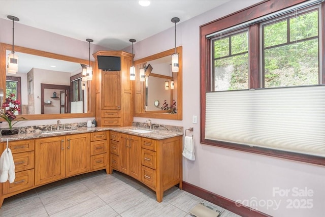 2461 Eagles Nest Rd, Waynesville, NC 28786 - bathroom featuring double vanity, tile patterned flooring, baseboards, and recessed lighting